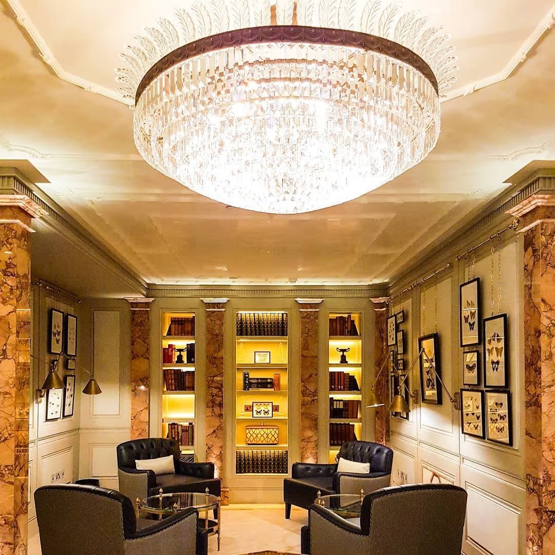 Golden chandelier, bespoke luxury lighting for hotels and hospitality interiors